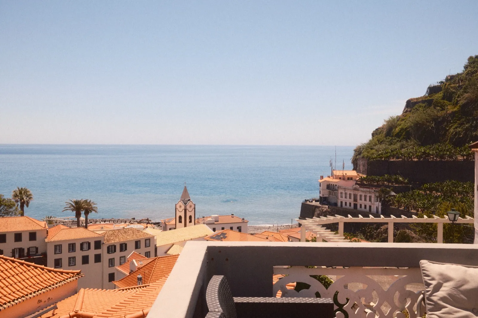 Banana House balcony overlooking Ponta do Sol and the Atlantic